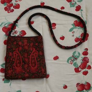 Red embroidered cross body bag